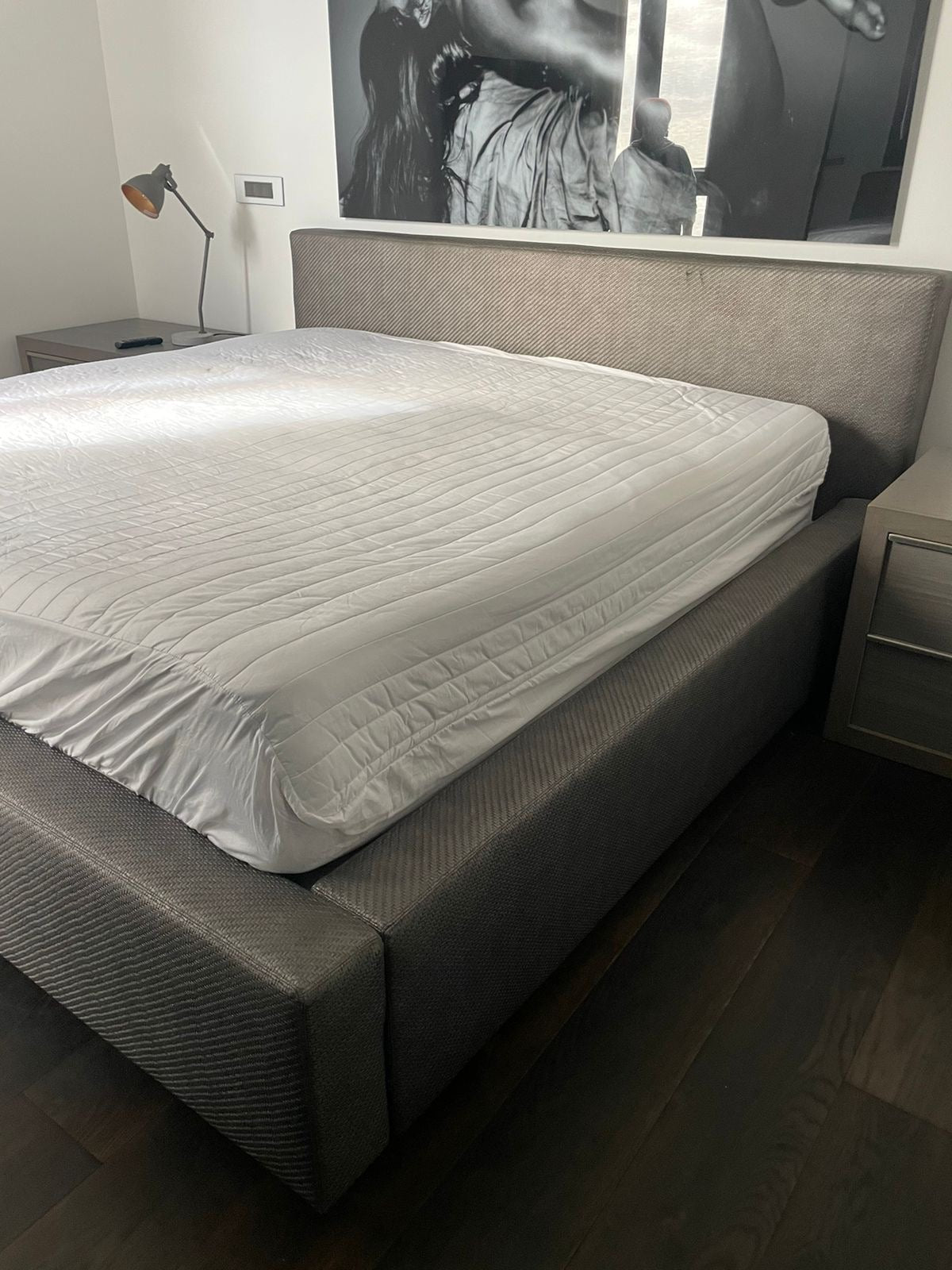 Silver leather woven King size bed with mattress .