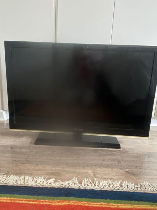 40inch Samsung TV on a stand with remote ( Not Smart TV)