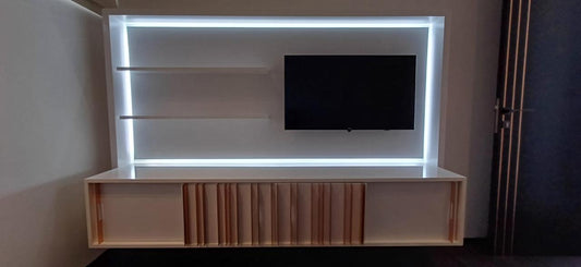 Stunning bespoke tv unit in white with pink gold decor with LED lights in the unit . R15000. Size length 2.25m x width 53.5cm.