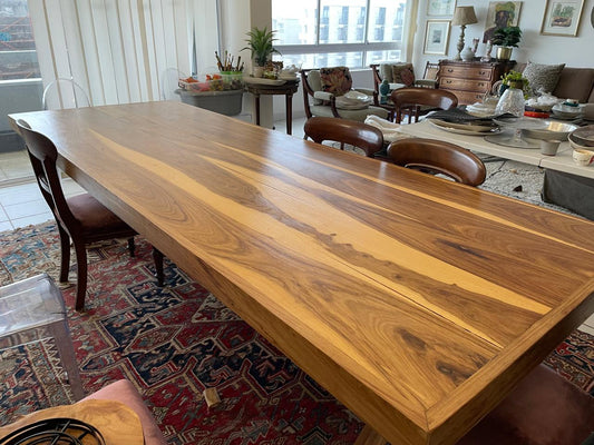 Solid wood dining table. Seats about 14 . Size H 80cm, L3m, W 106cm. R18000