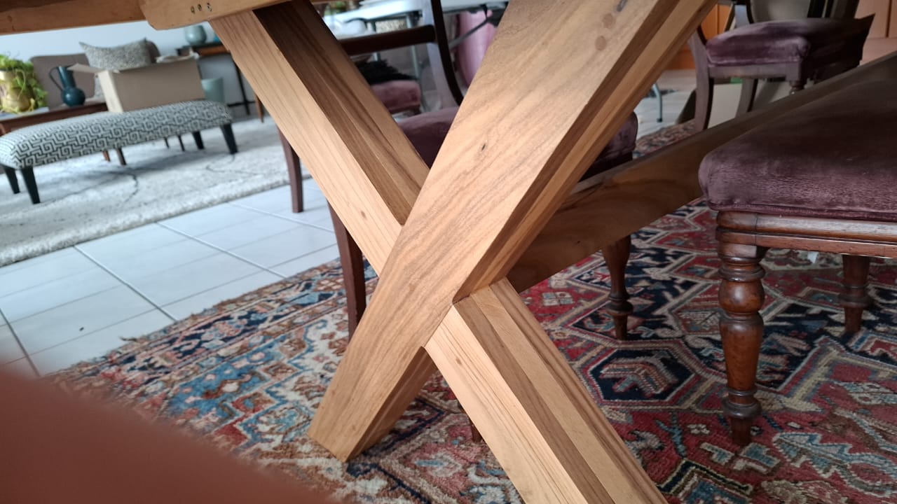 Solid wood dining table. Seats about 14 . Size H 80cm, L3m, W 106cm. R18000